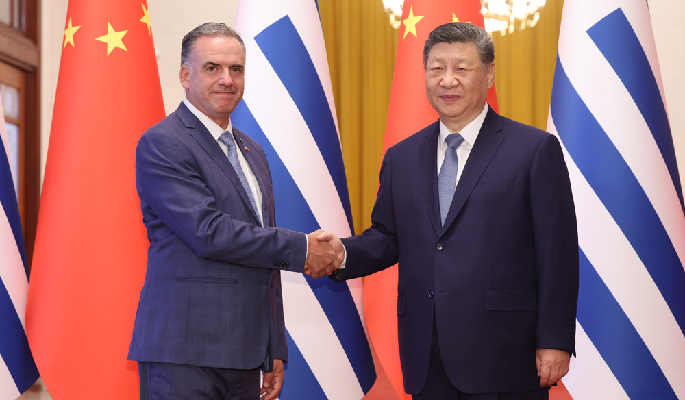 習(xí)近平同烏拉圭總統(tǒng)奧爾西舉行會(huì)談